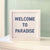 Cottage Shore - The Welcome To Paradise Framed Sign